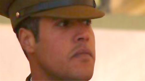 Qaddafi son, reported killed, appears on TV