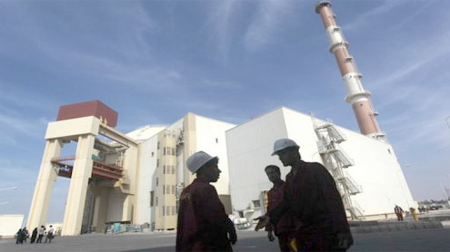 Iran wants sanctions eased, hints on enrichment