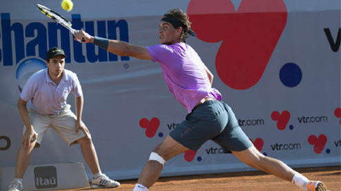 Nadal triumphs in singles return